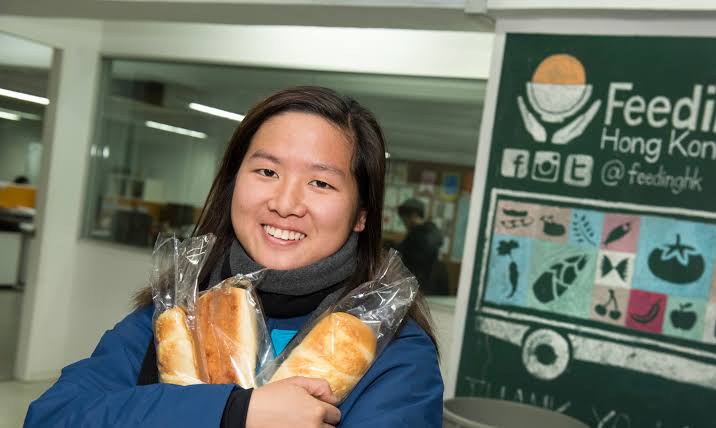Volunteers sorting donated food and supplies for community partners, Julia M Cameron on Pexels.